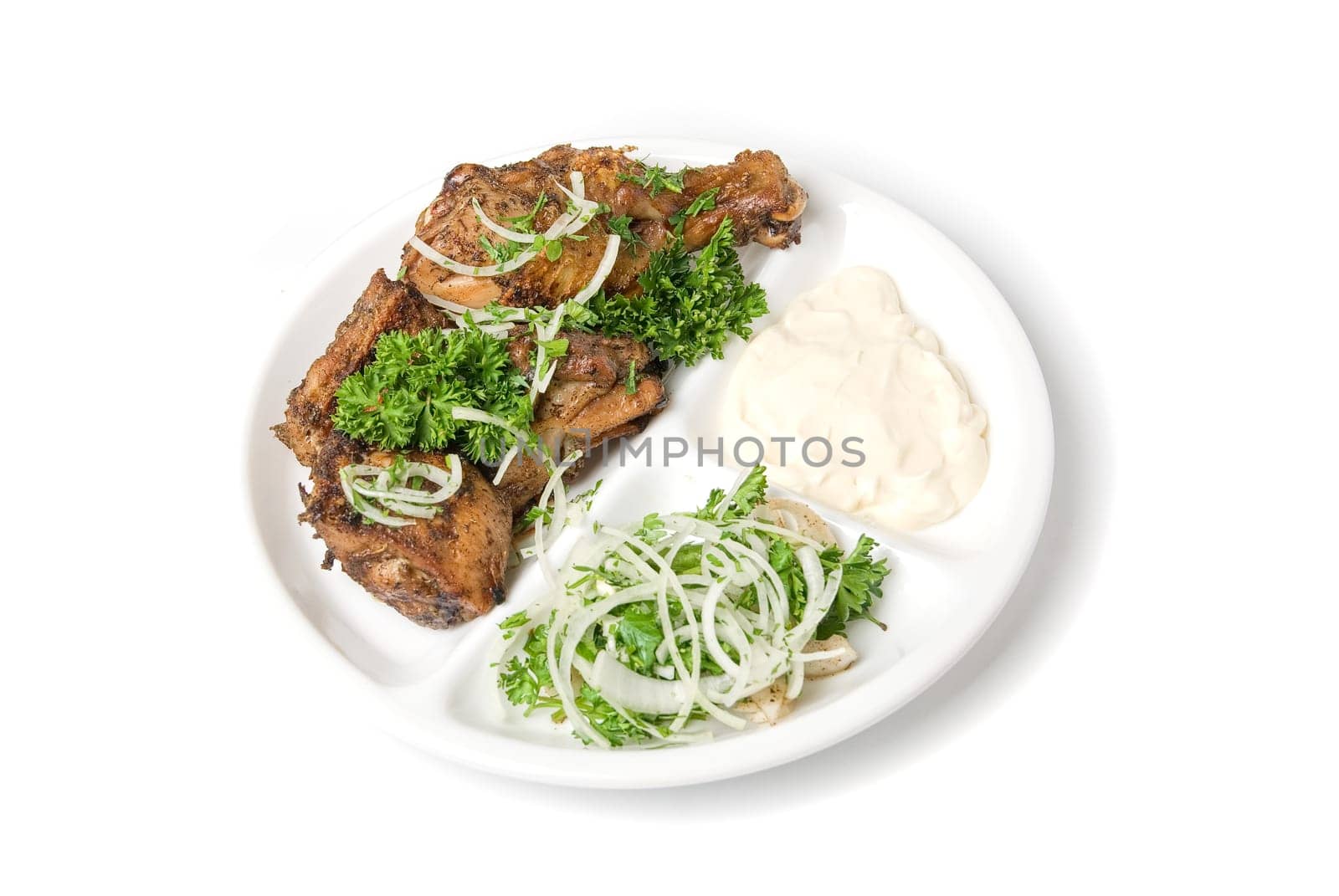 meat with sauce and vegetables isolated on white background