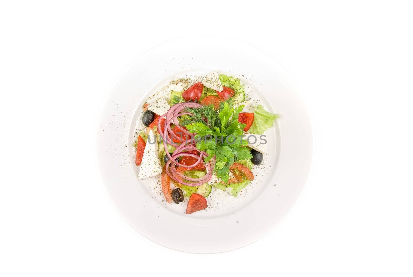 Greece salad dish close up on a white background