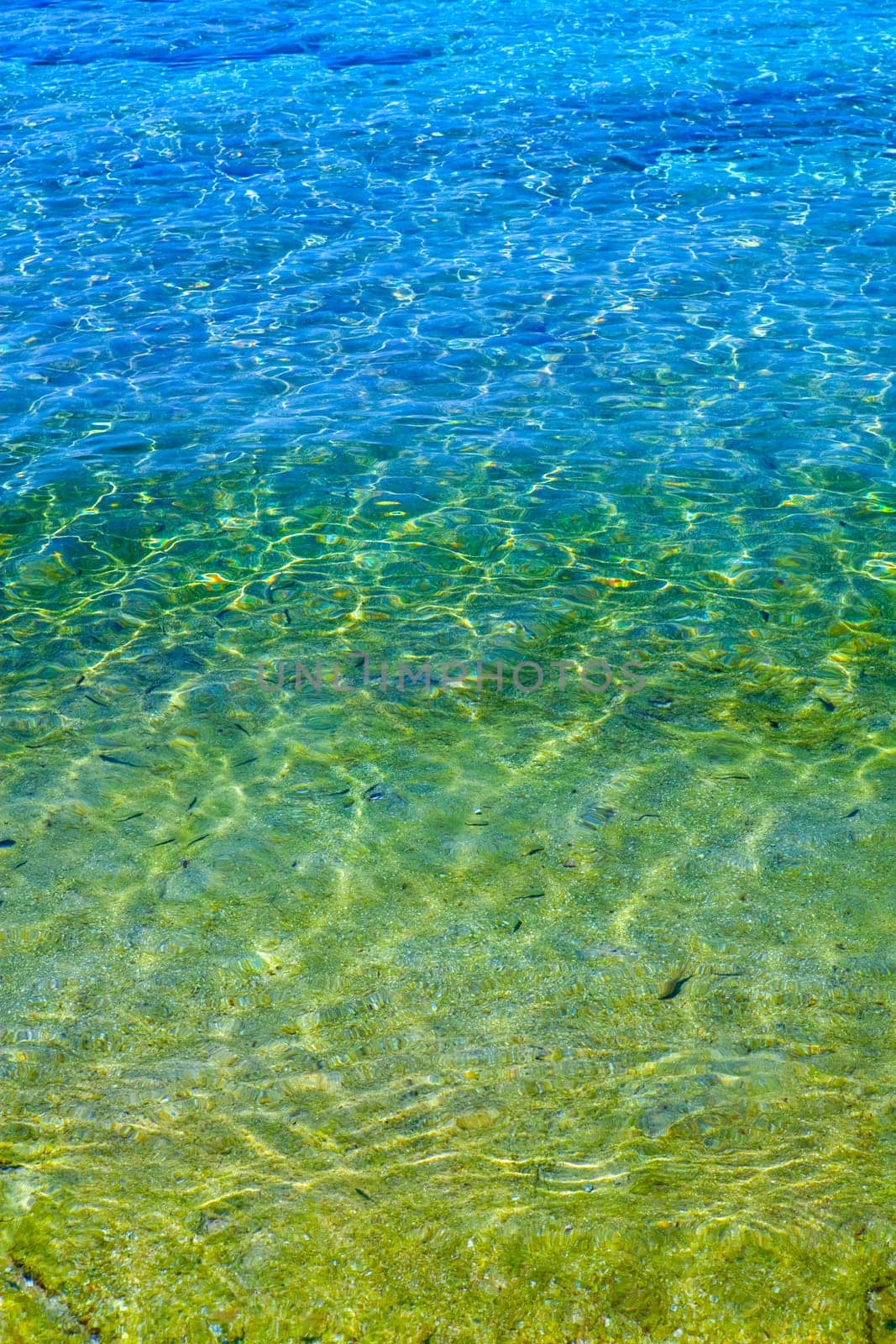 Close-up of water at a beach in Greece on a hot day