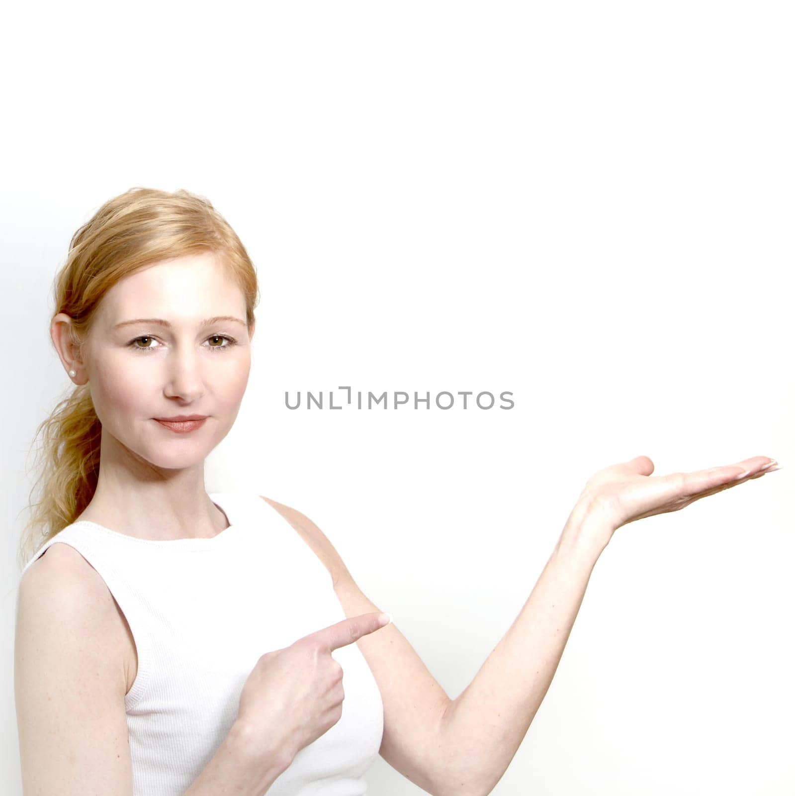 Pretty,cool woman presenting something - square