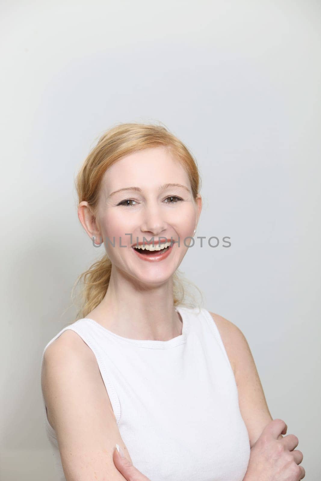 Laughing Woman with Crossed Arms - portrait