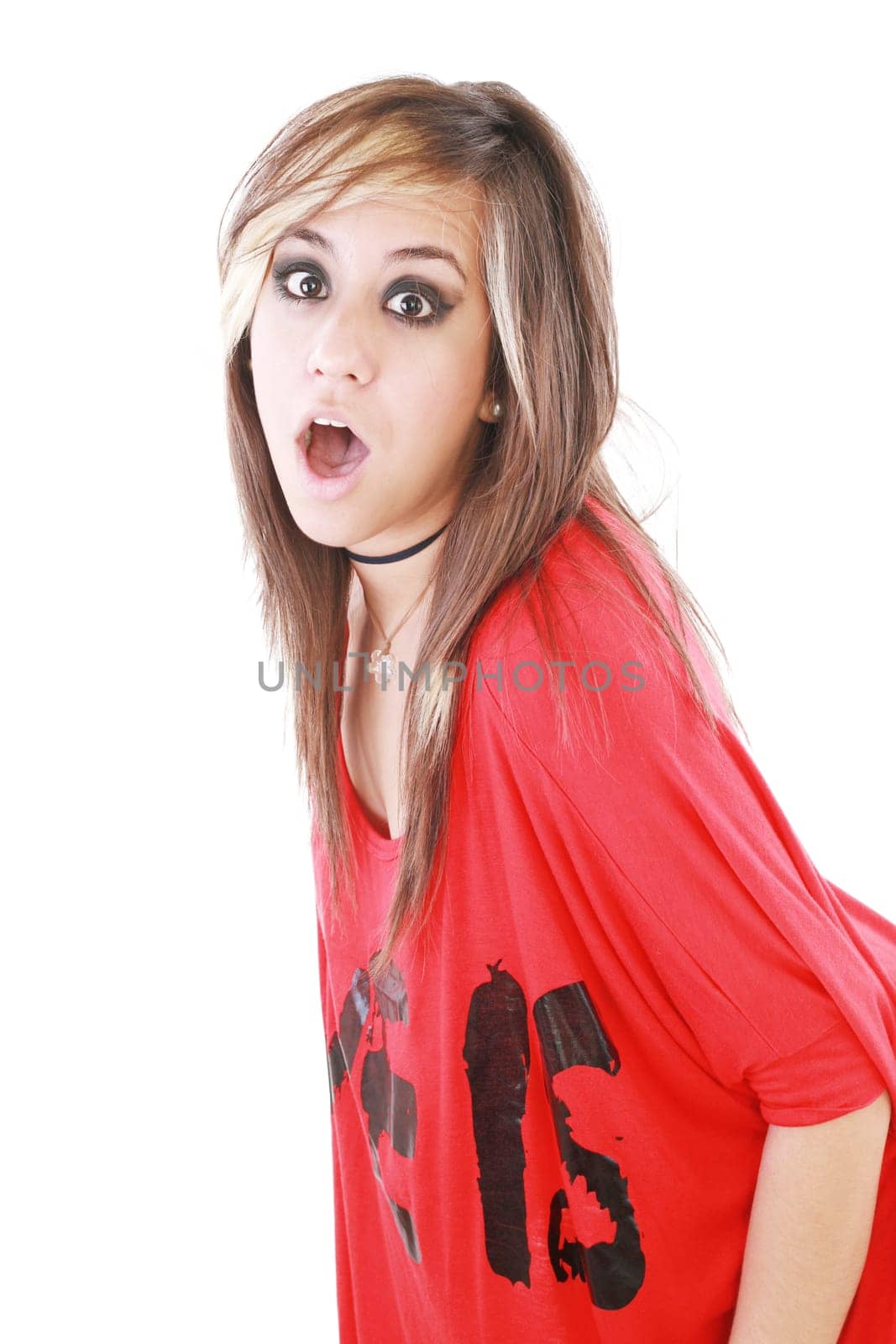 Shocked trendy teenage girl posing mouth open
