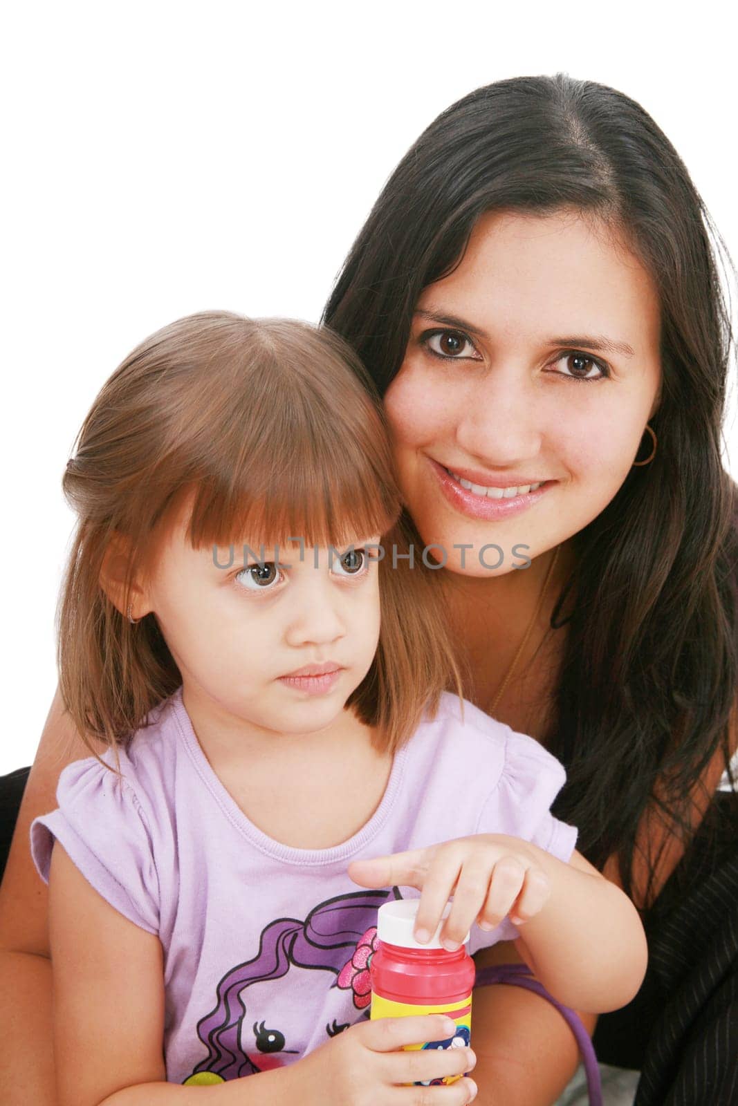 Young mother and daugther embracing