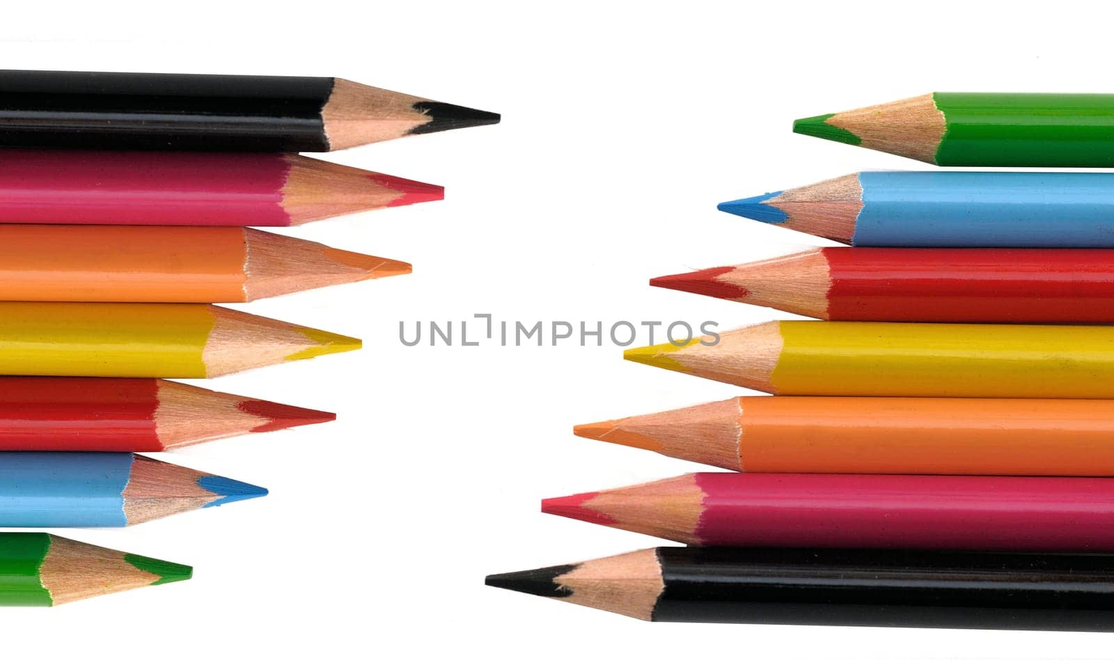 Colored pencils isolated on black back ground
