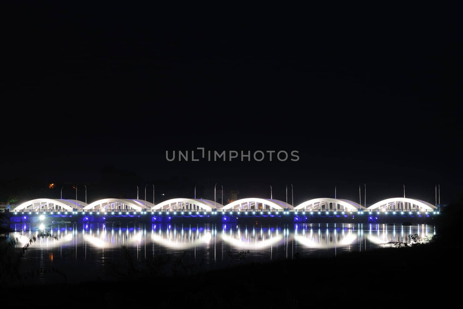 colorfully and beautifully lit bridge during the night