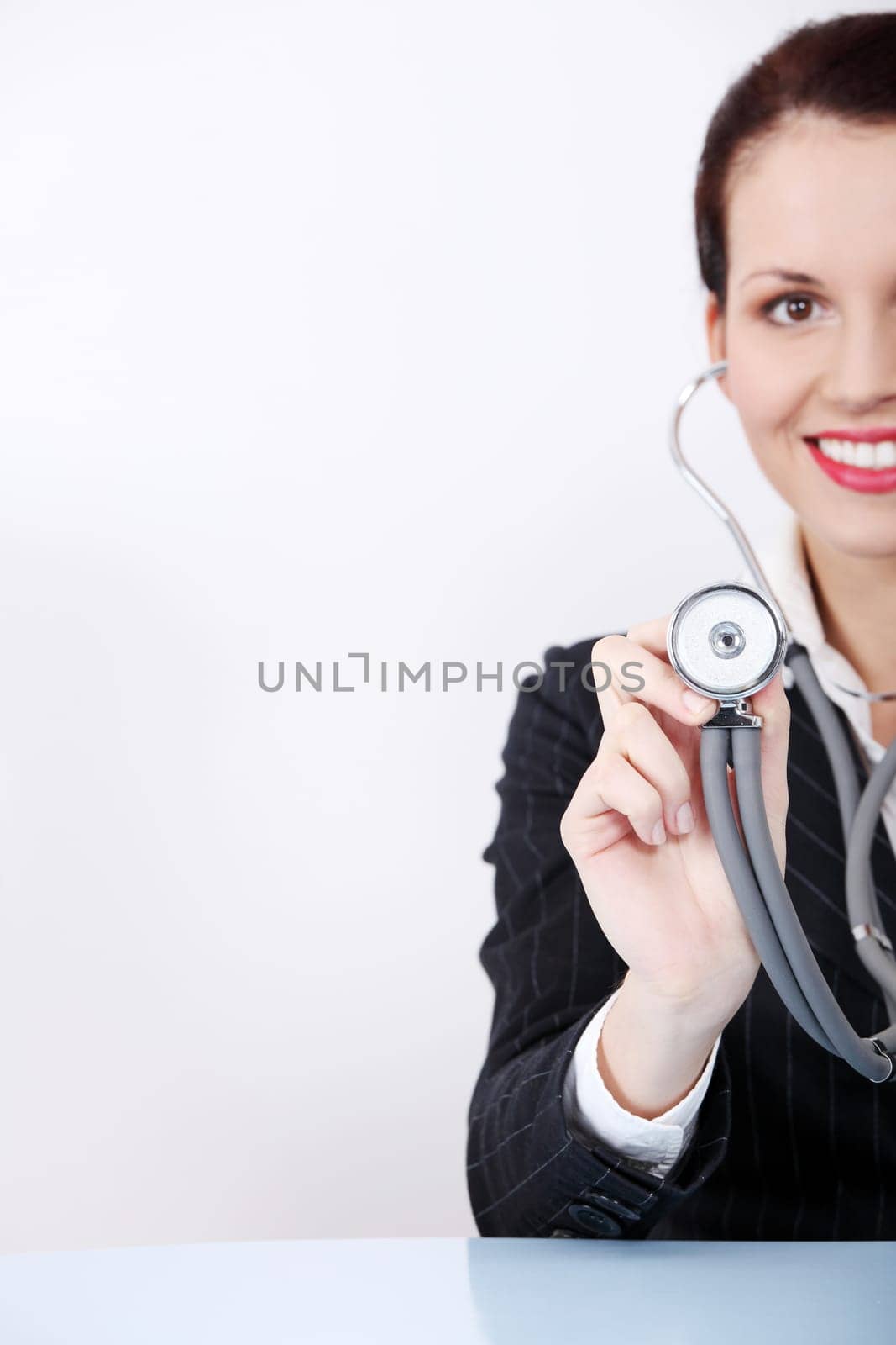Pretty caucasian woman with stethoscope.