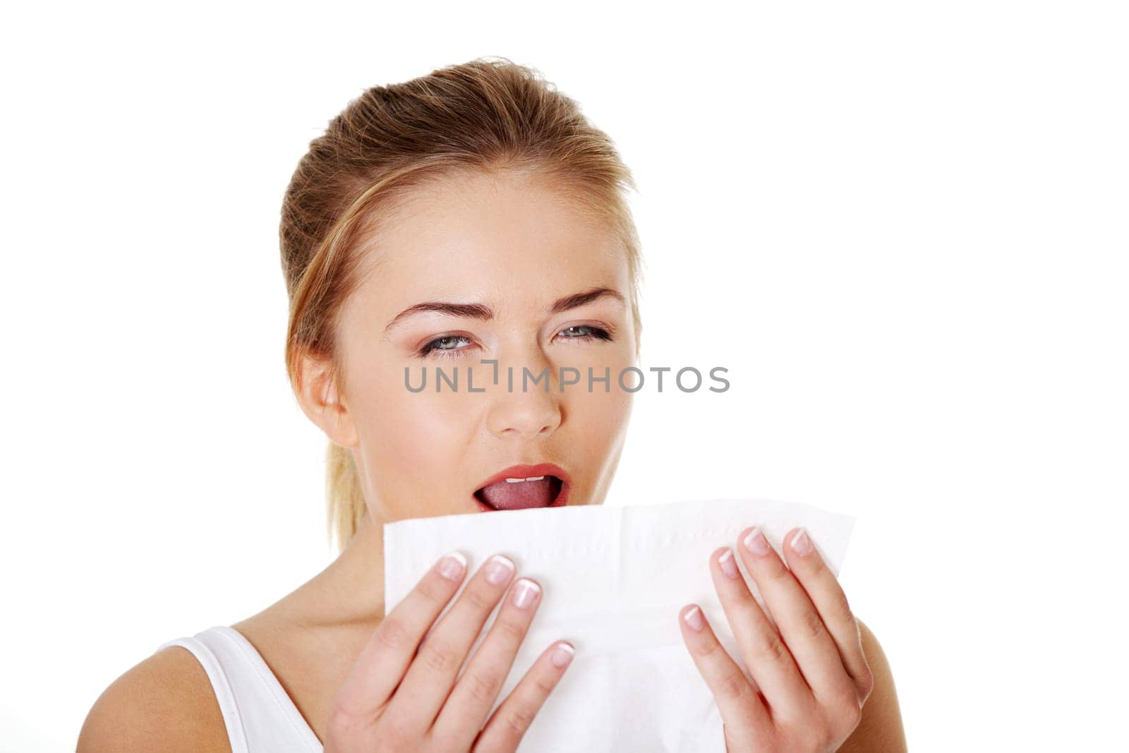 Teen woman with tissue - sneezing