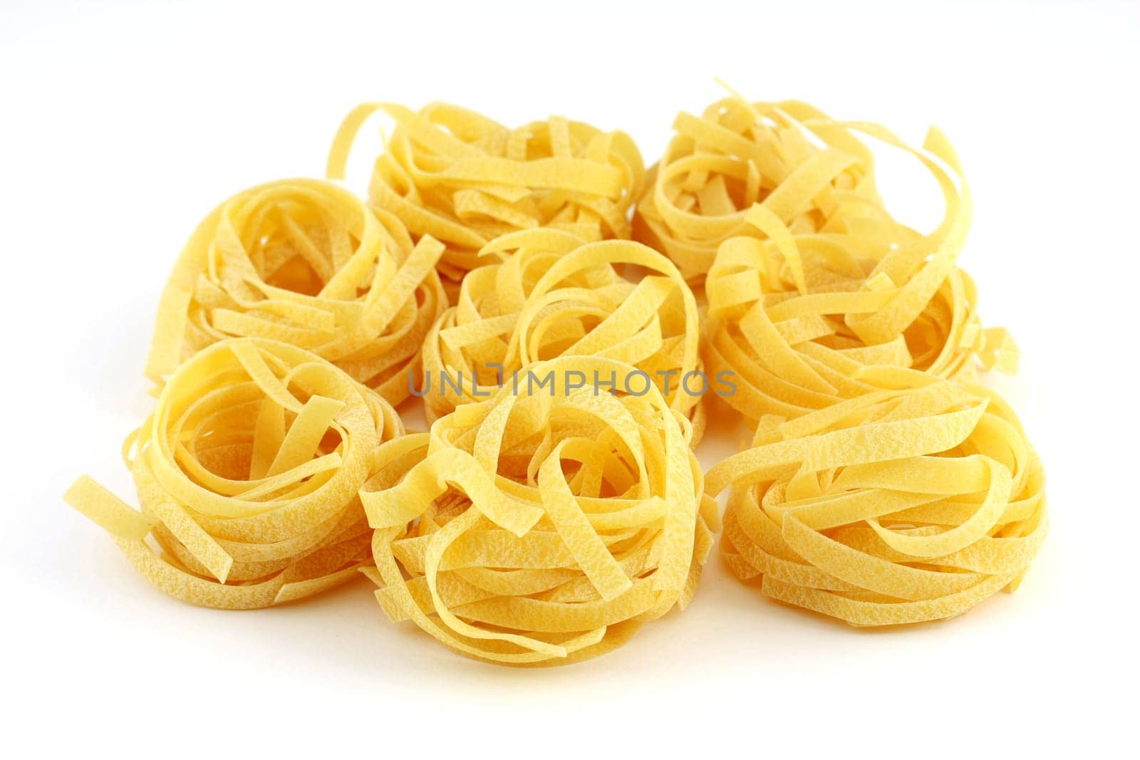 Tagliatelle, isolated on white