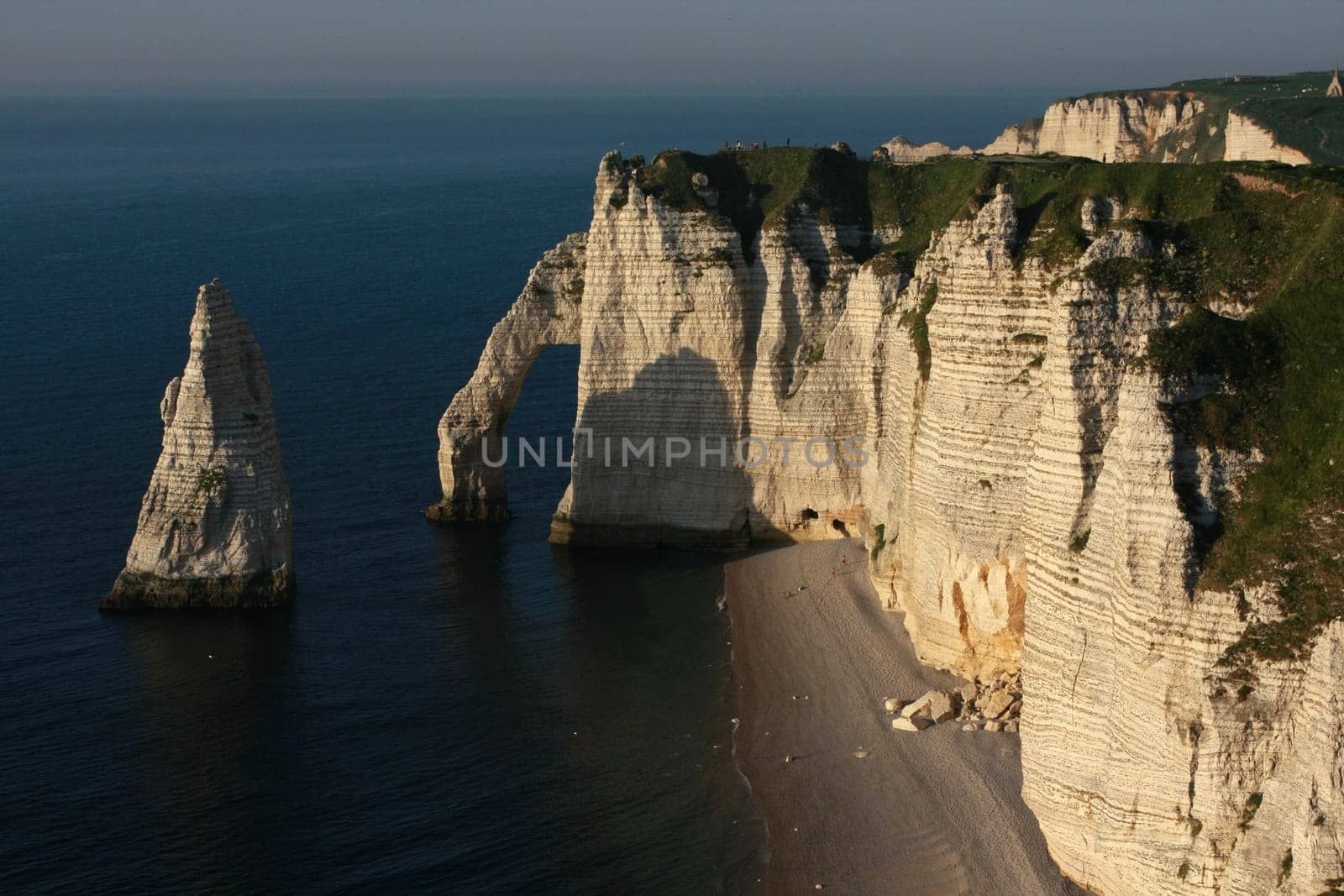 Spectacular cliffs and a natural arch, Etretat, Normandy, France