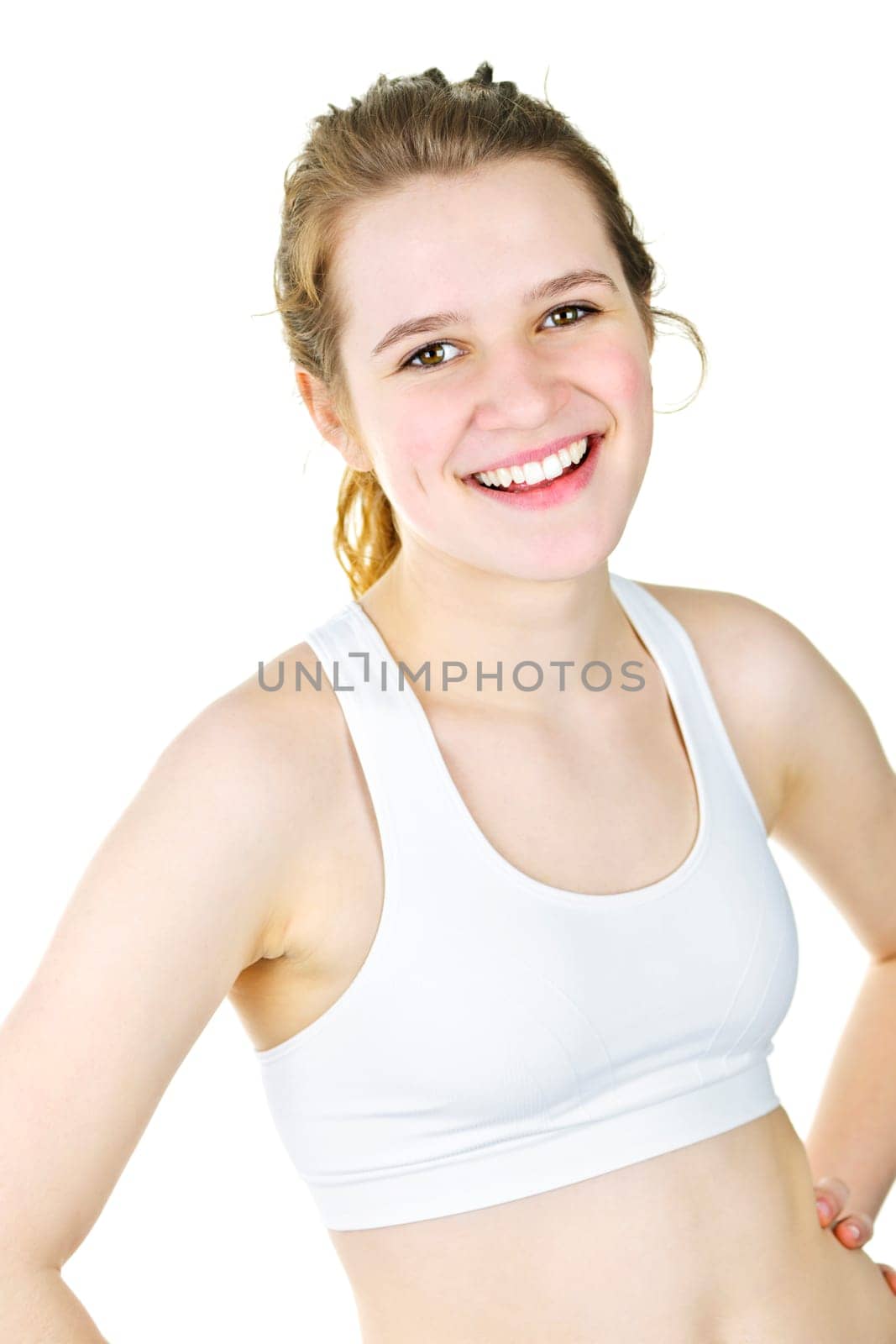 Smiling fit young woman ready for workout on white background
