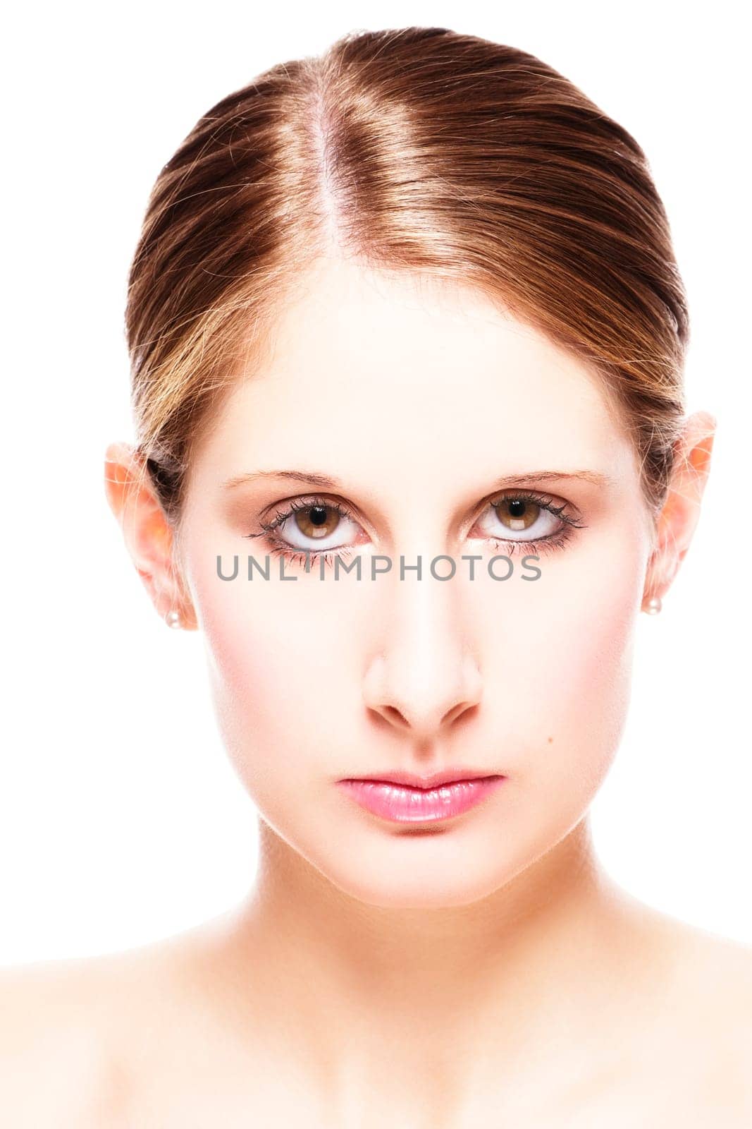 Close-up of a young beautiful woman on a white background