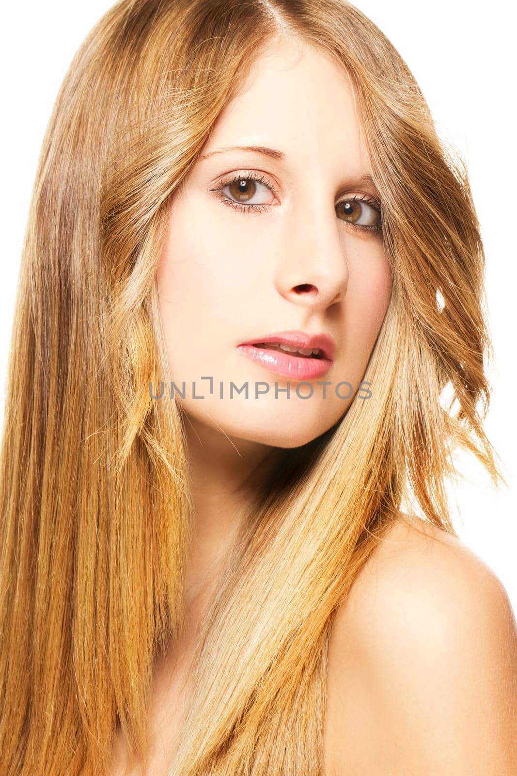 Portrait of a young beautiful woman on white background