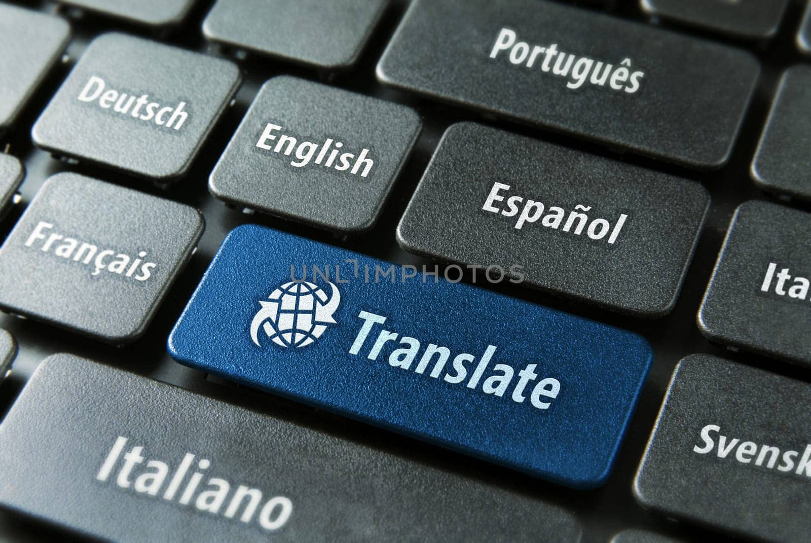 Multilingual translation online concept. Close up of multi language keyboard and translate word key in blue color with clippingpath.