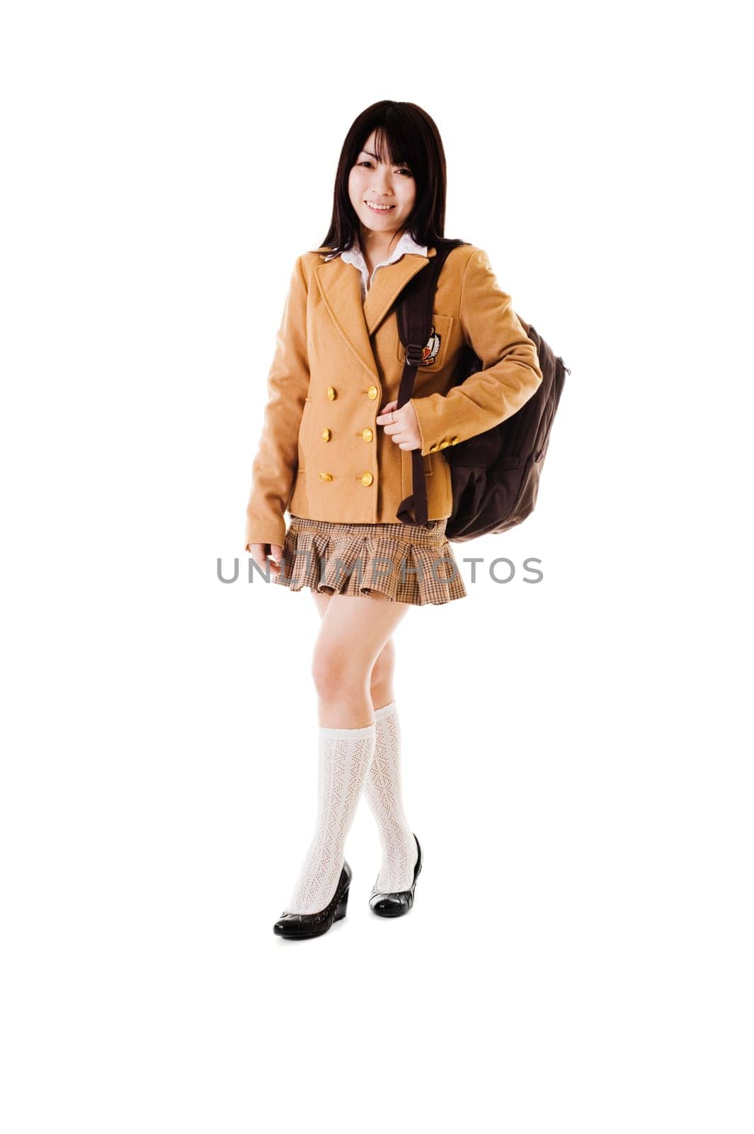 Female Chinese student wearing a backpack on a white background.