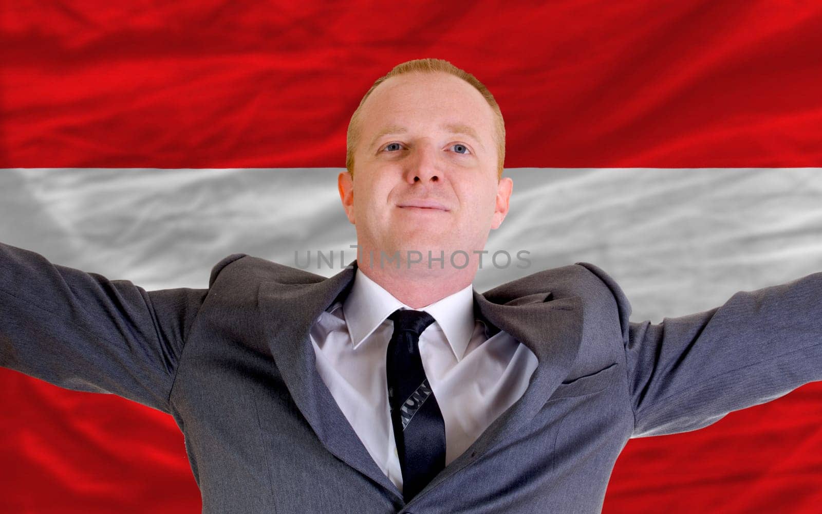 joyful investor spreading arms after good business investment in austria