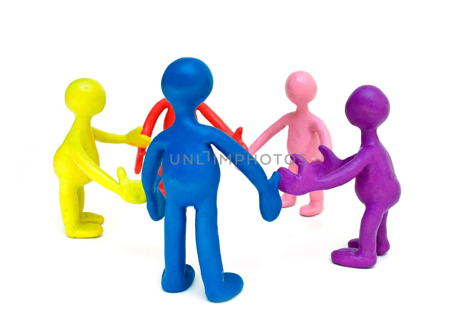Look on discussing group of plasticine colored puppets