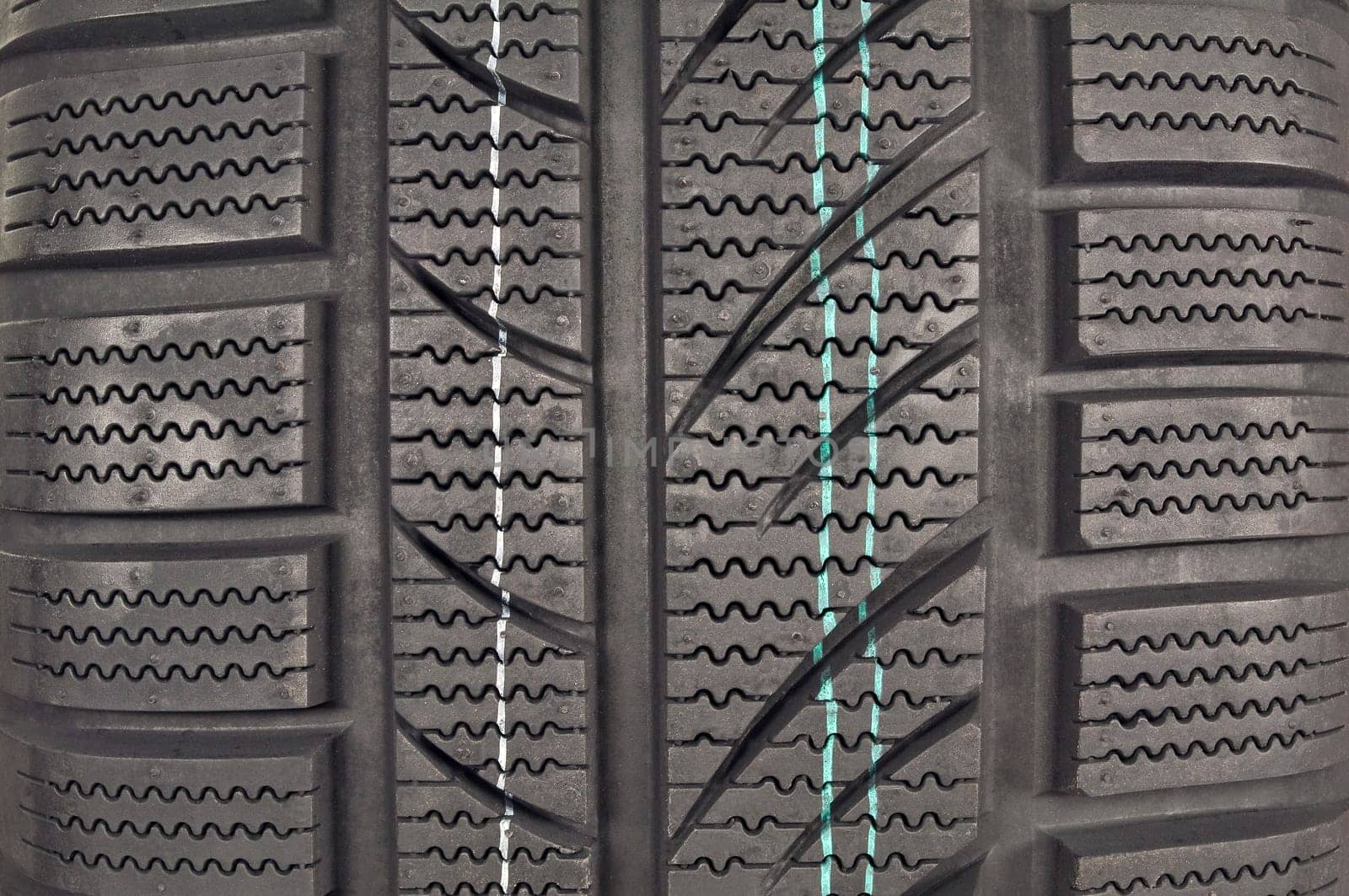 New winter tire pattern close up.