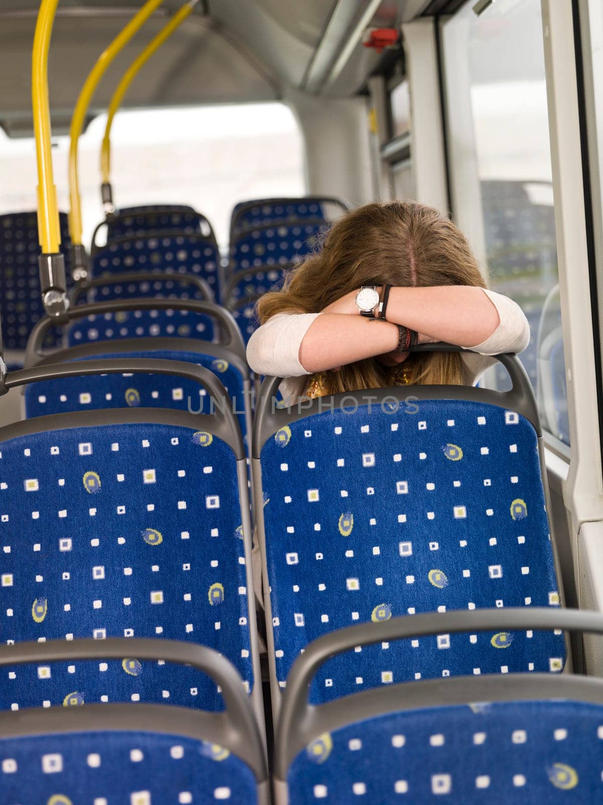 Sad woman alone on the bus
