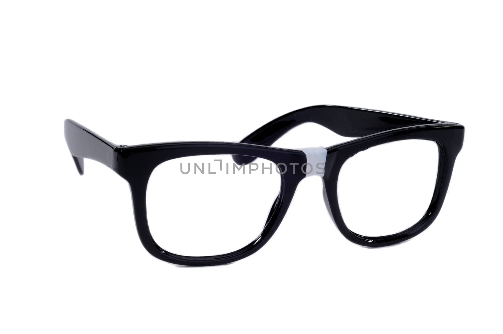 Pair Of Black Sixties Style Glasses With Tape On For A Geek Nerd Style