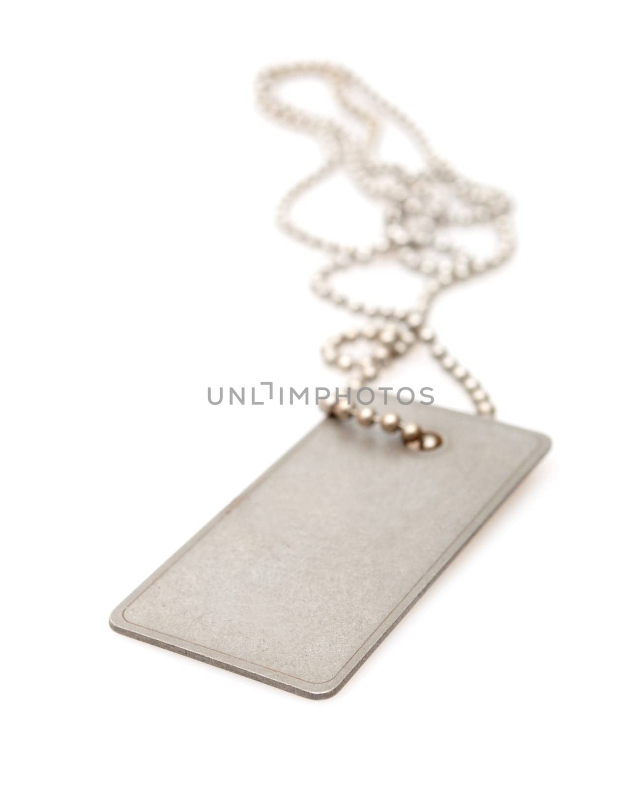 Shiny Blank Metallic Military Identification Plate on White Background With Shadow - Shallow Depth of Field