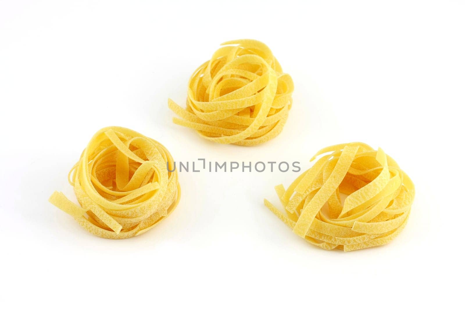 Tagliatelle, isolated a white background