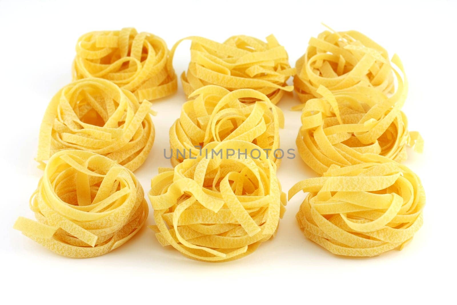 Tagliatelle, isolated on white