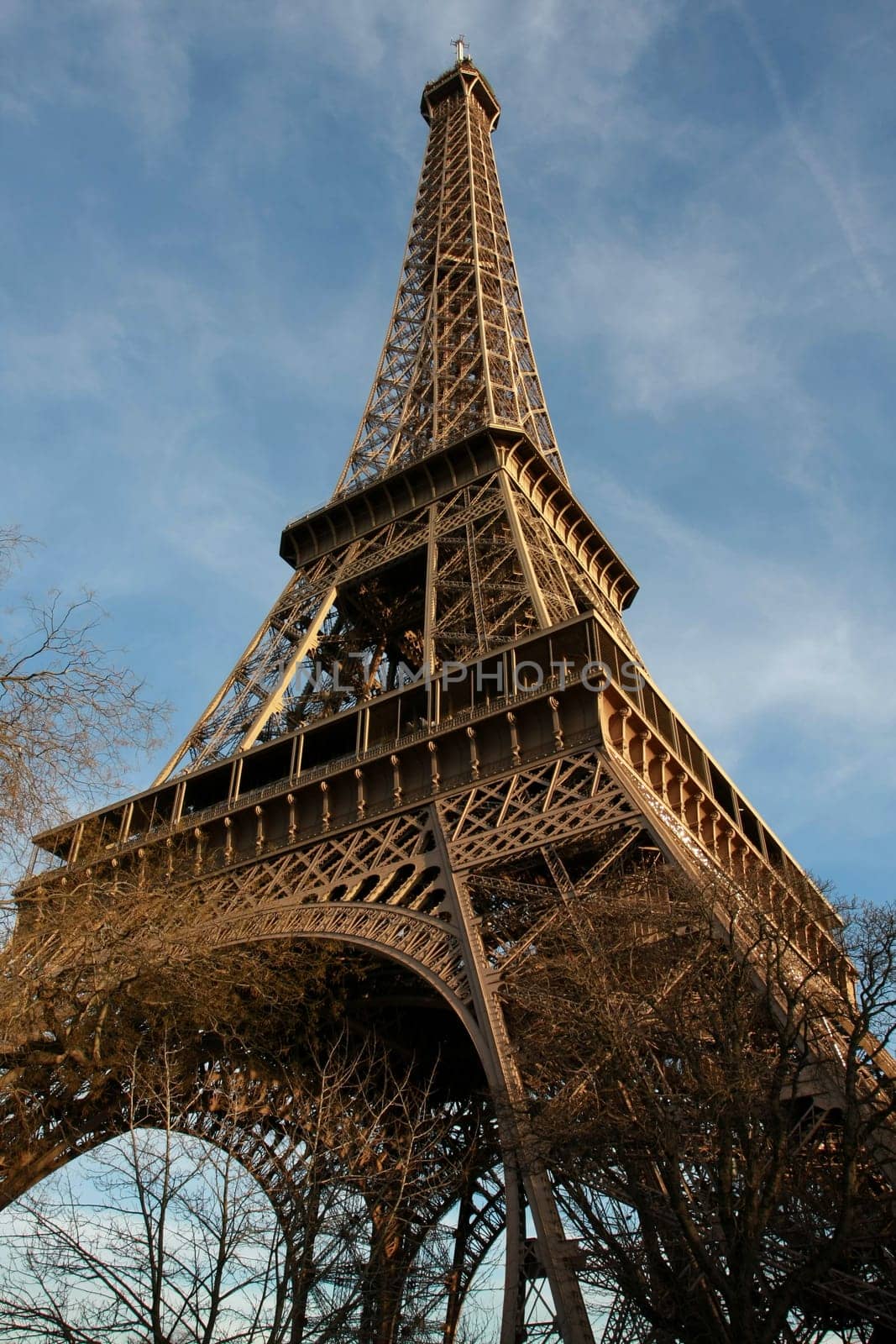 Wide-angle view of the Eiffel Tower by sunset, Paris, France