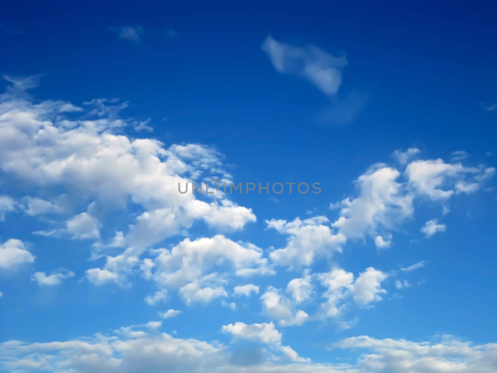 White clouds against blue sky
