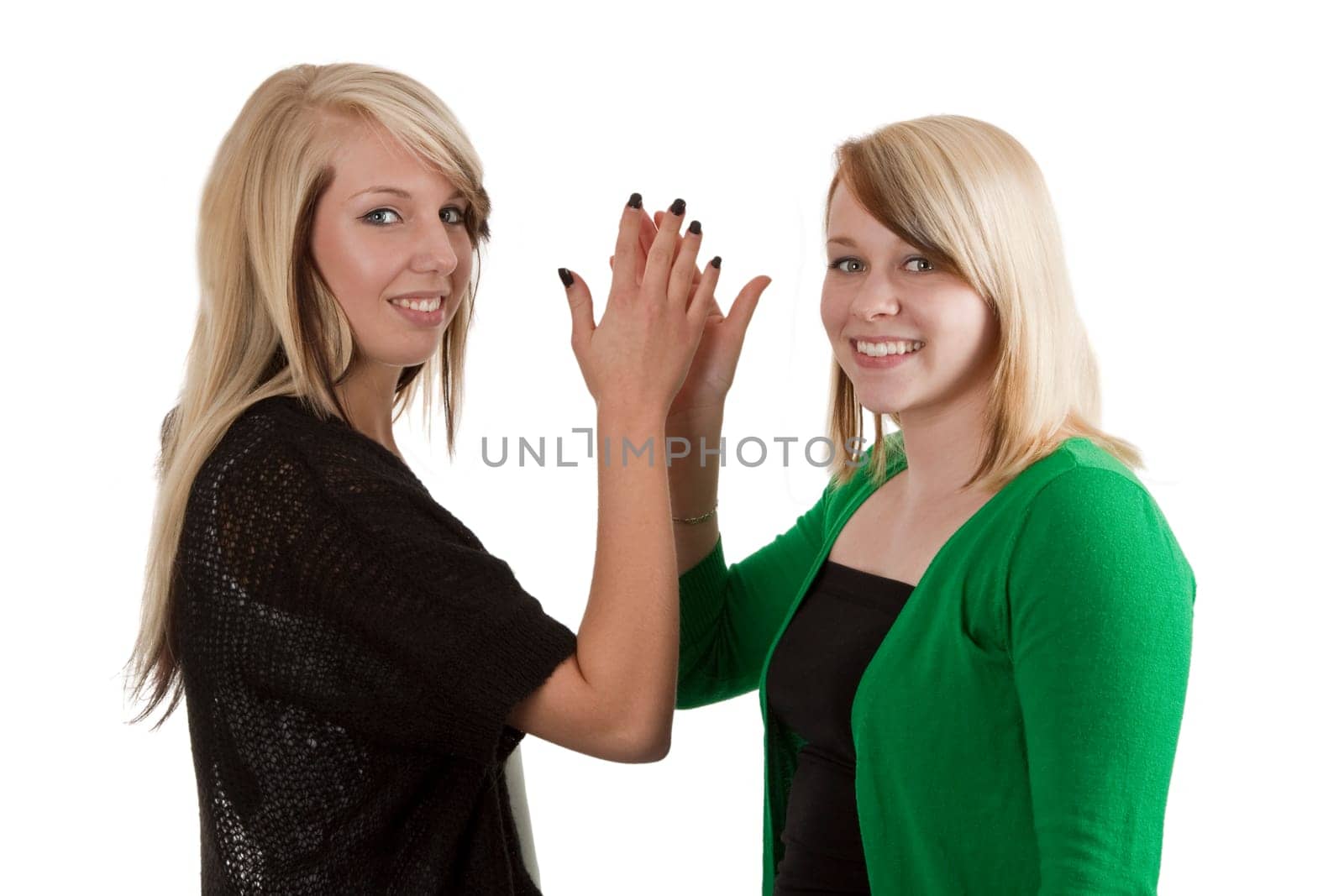 Two young women - free-spirited on white