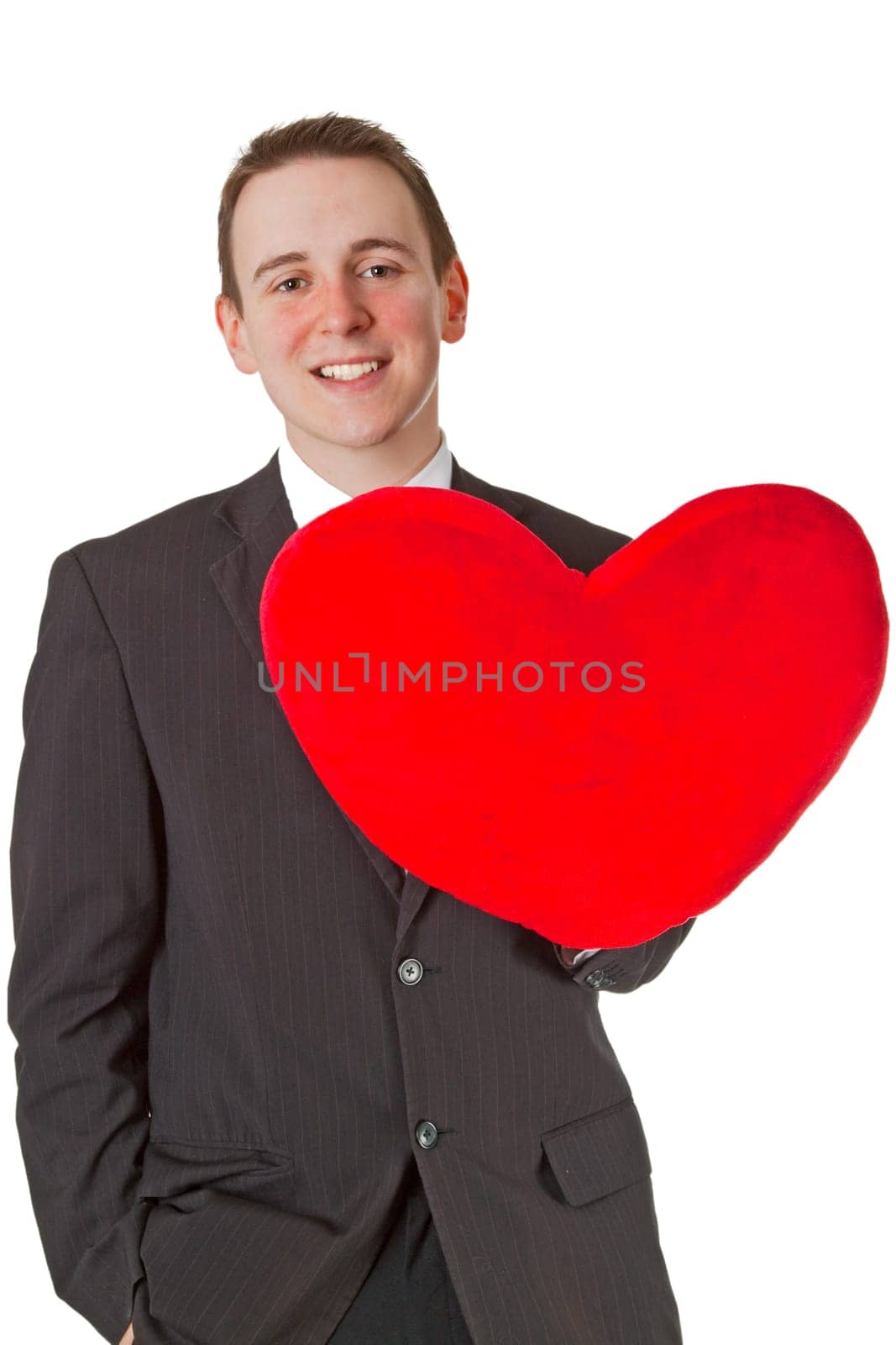 Successful businessman with cloth heart isolated on white background