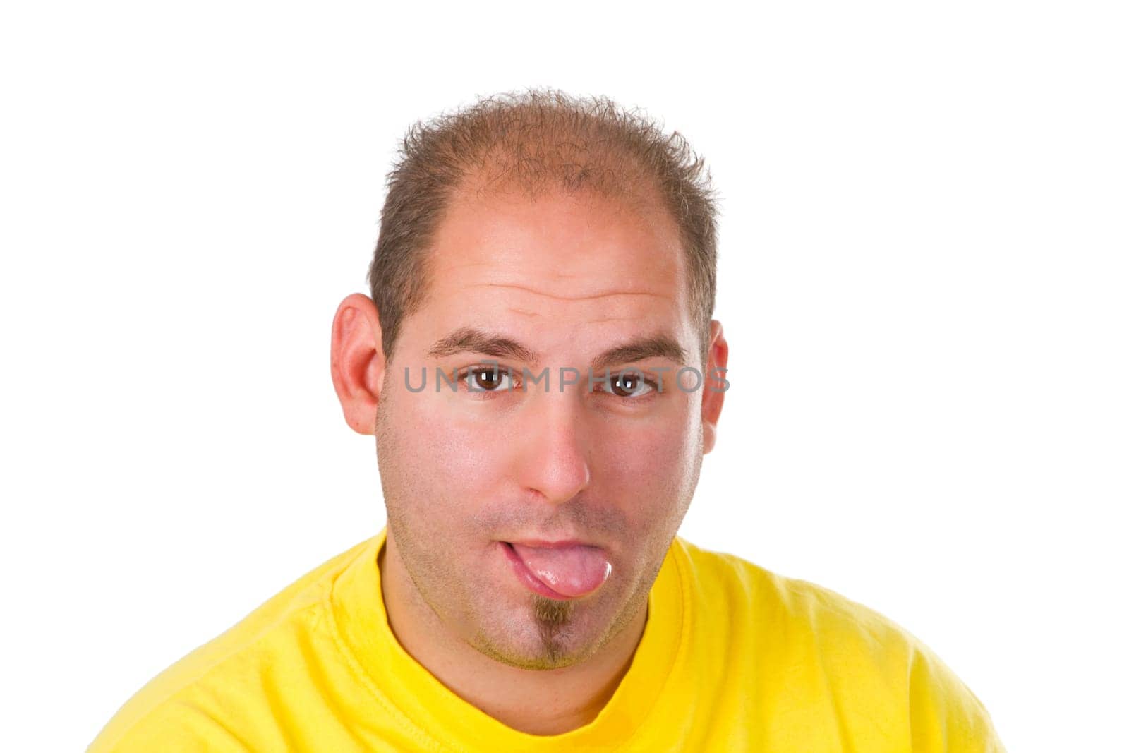 Young man sticking out tongue - isolated on white background