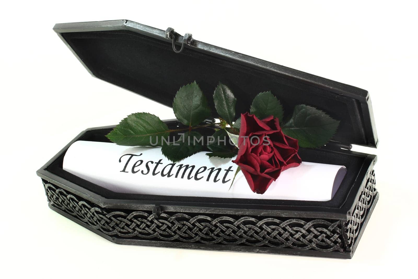 a small coffin with a will and a rose