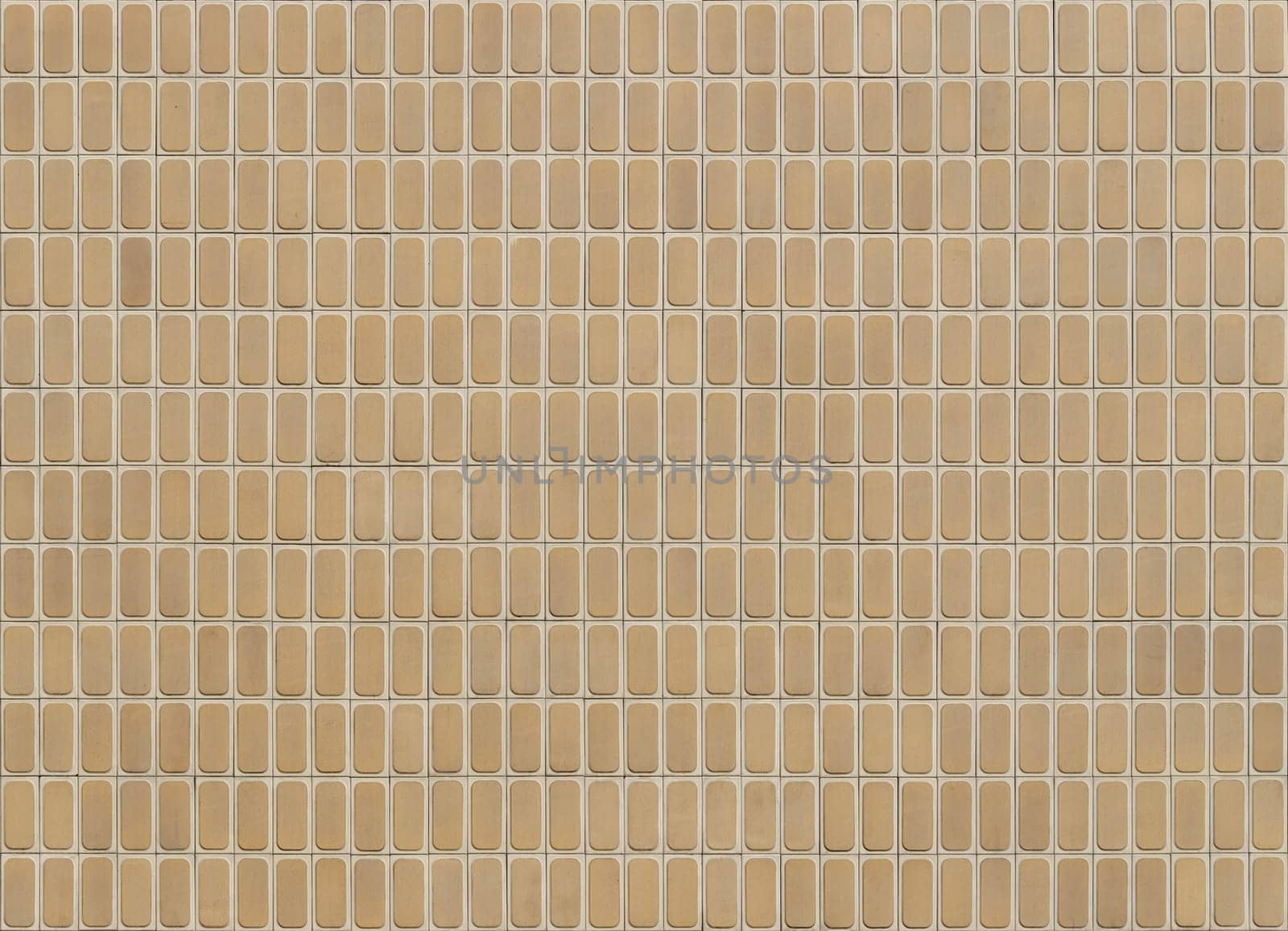 textured beige tile on a wall