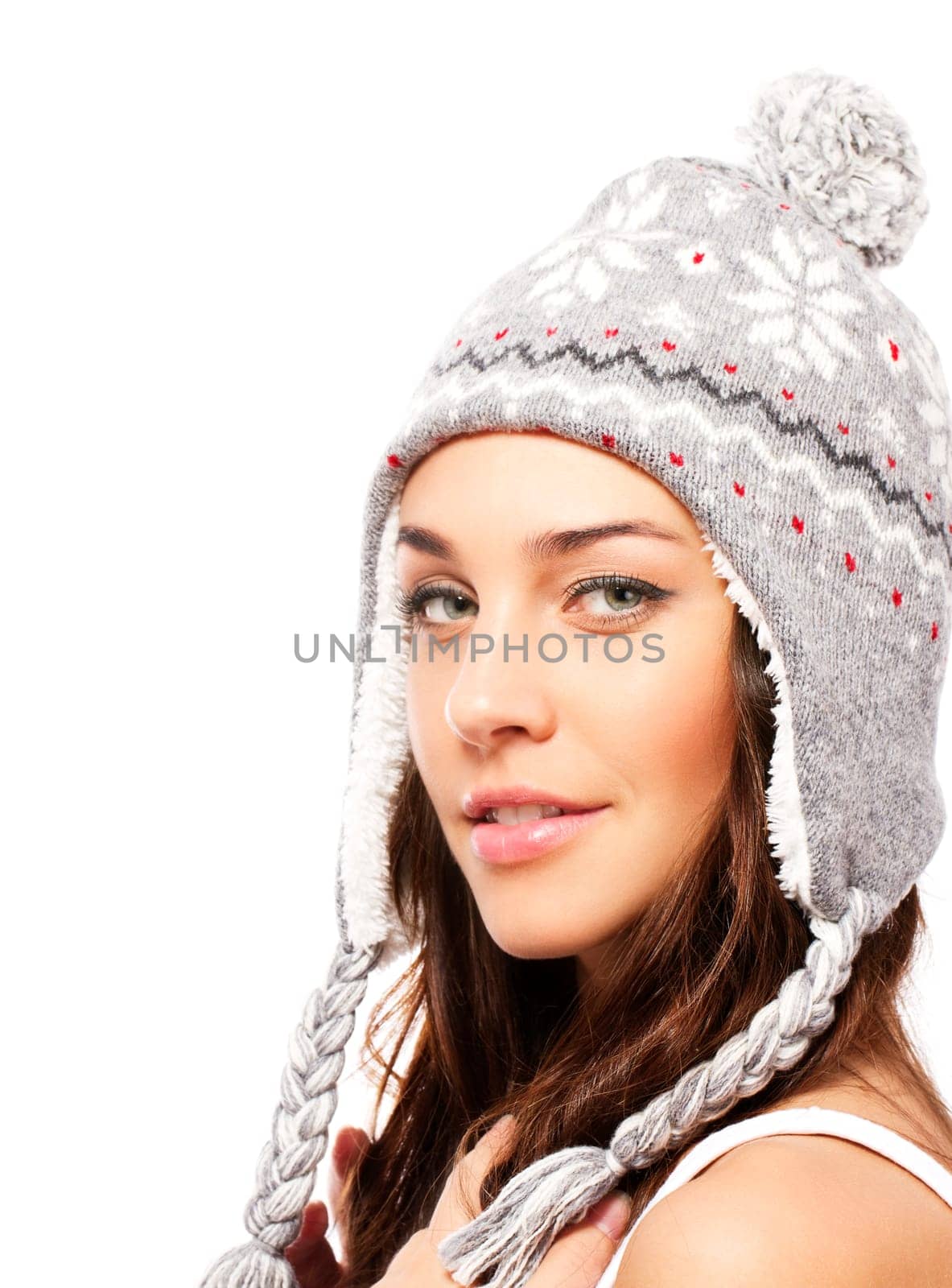 Beautiful smiling woman with winter hat on white background
