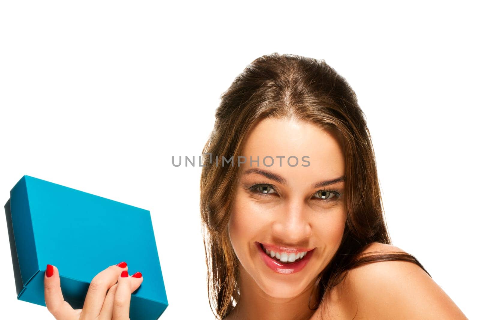 Happy beautiful woman holding gift on white background