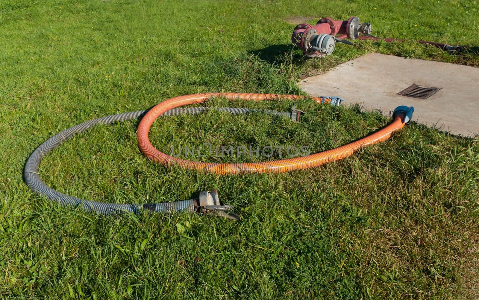 two large industrial water hoses