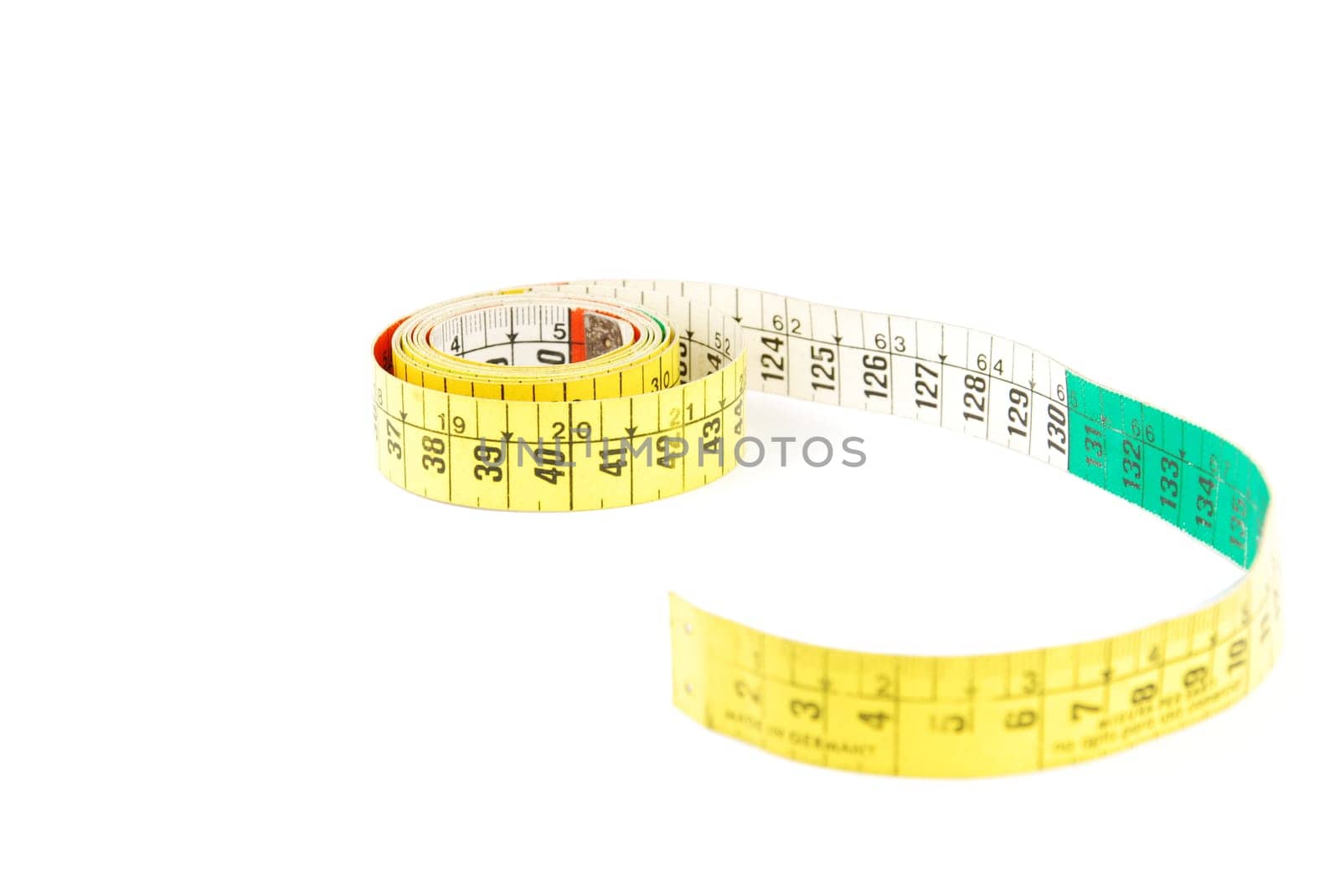 colorful measuring tape isolated on white background (shallow depth of field)