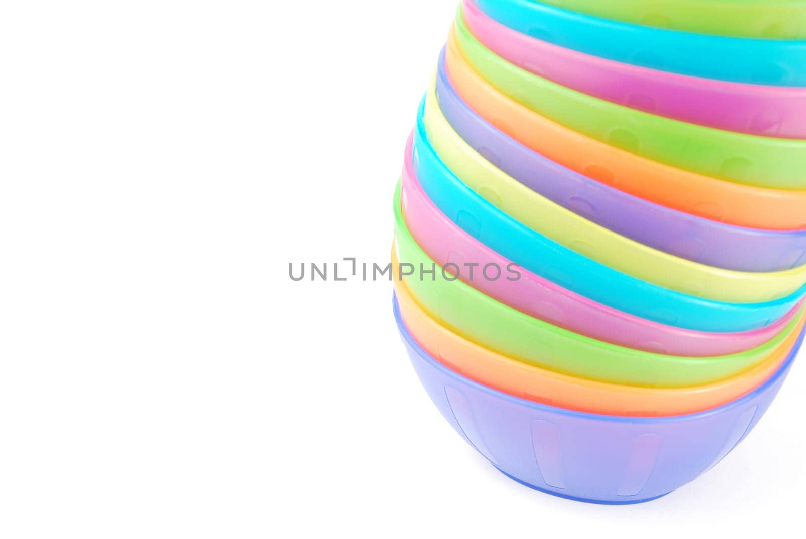 stacked colorful bowls isolated on white background
