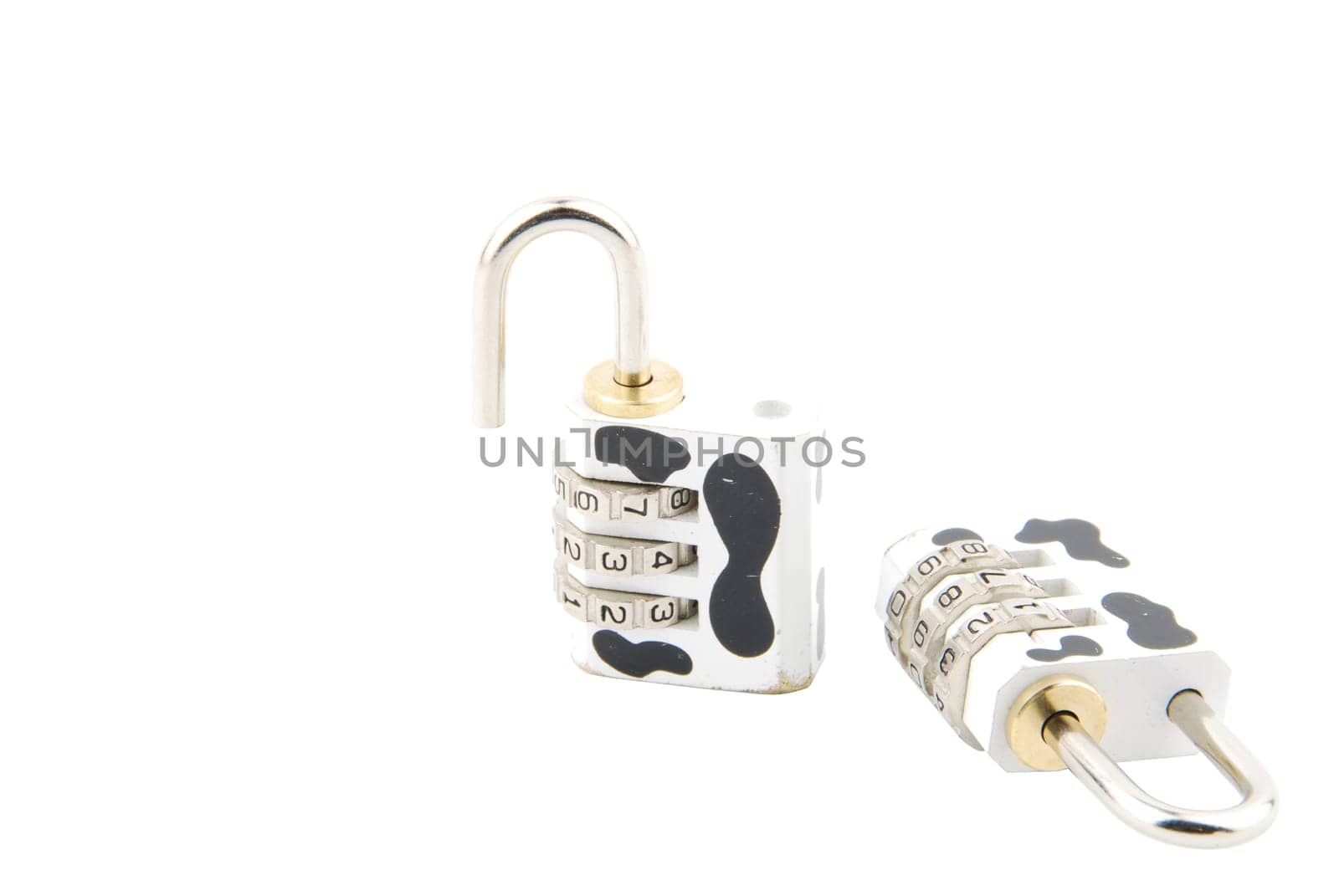 cow pattern combination padlock (closed and open) isolated on white background