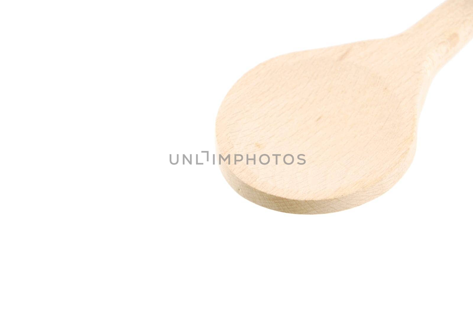 a spoon made of wood isolated on white background