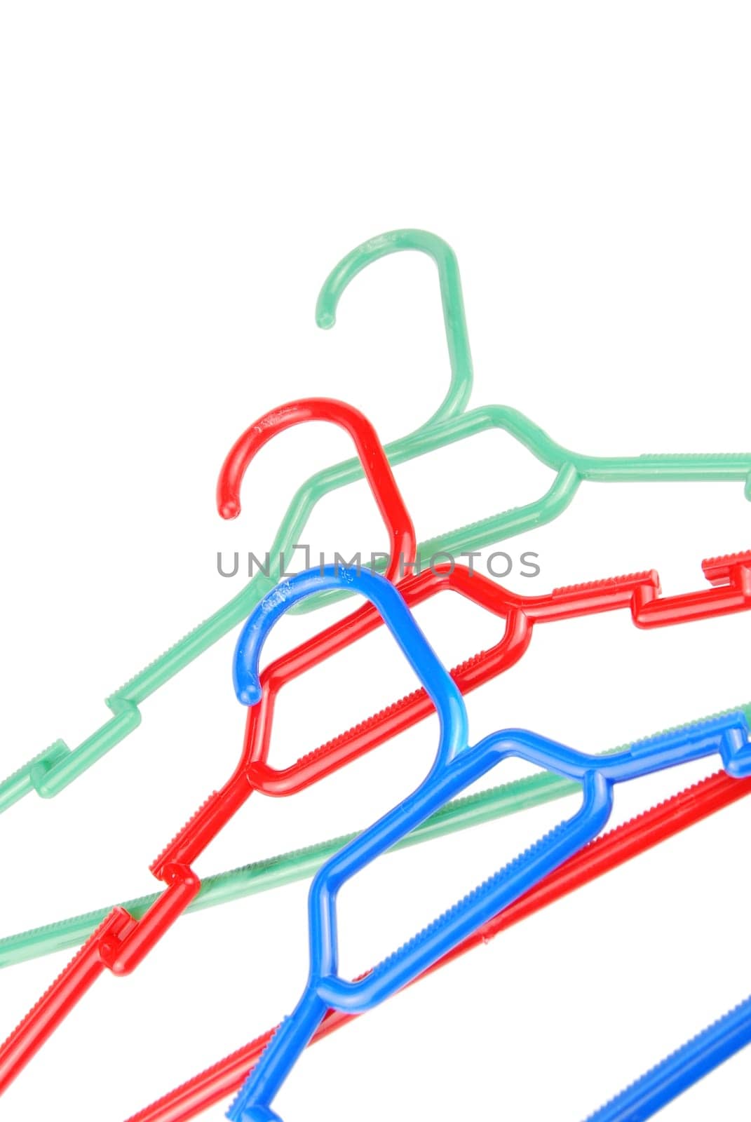colorful hangers for clothes isolated on white background