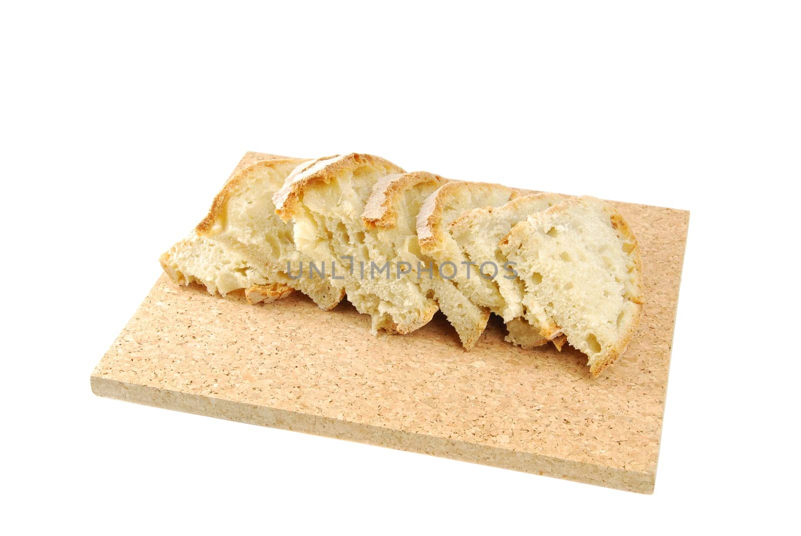 slices of cantle wheaten bread on a cork tray (isolated on white background)
