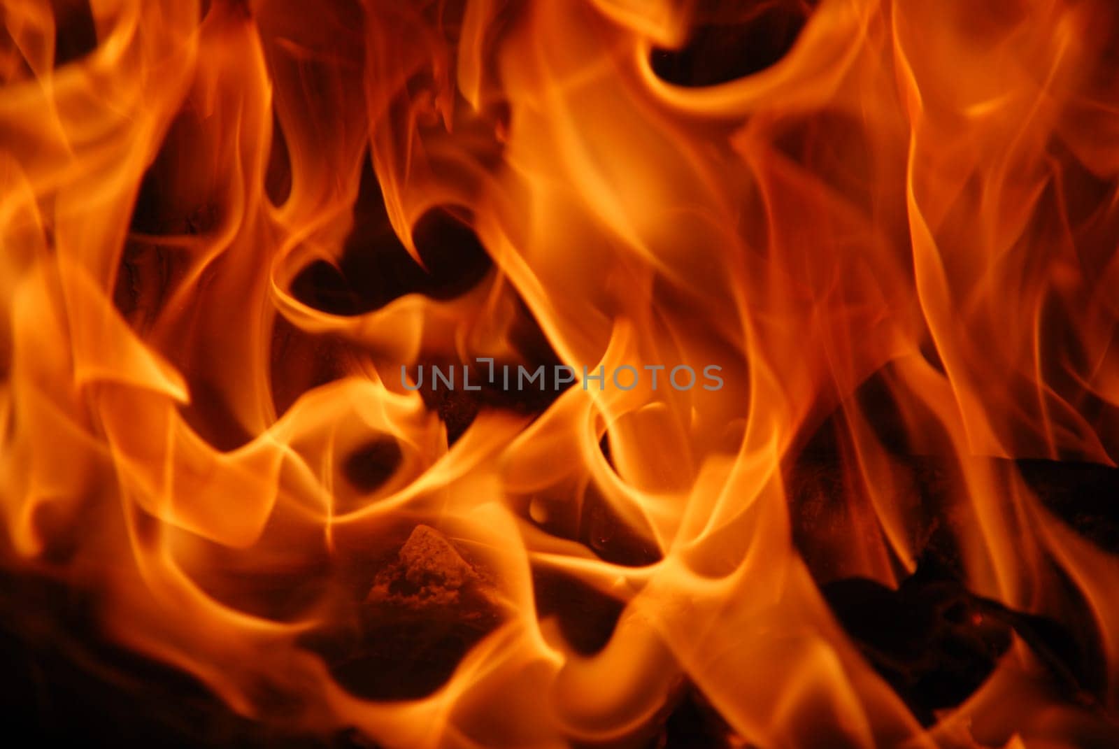beautiful flames burning on a cozy fireplace