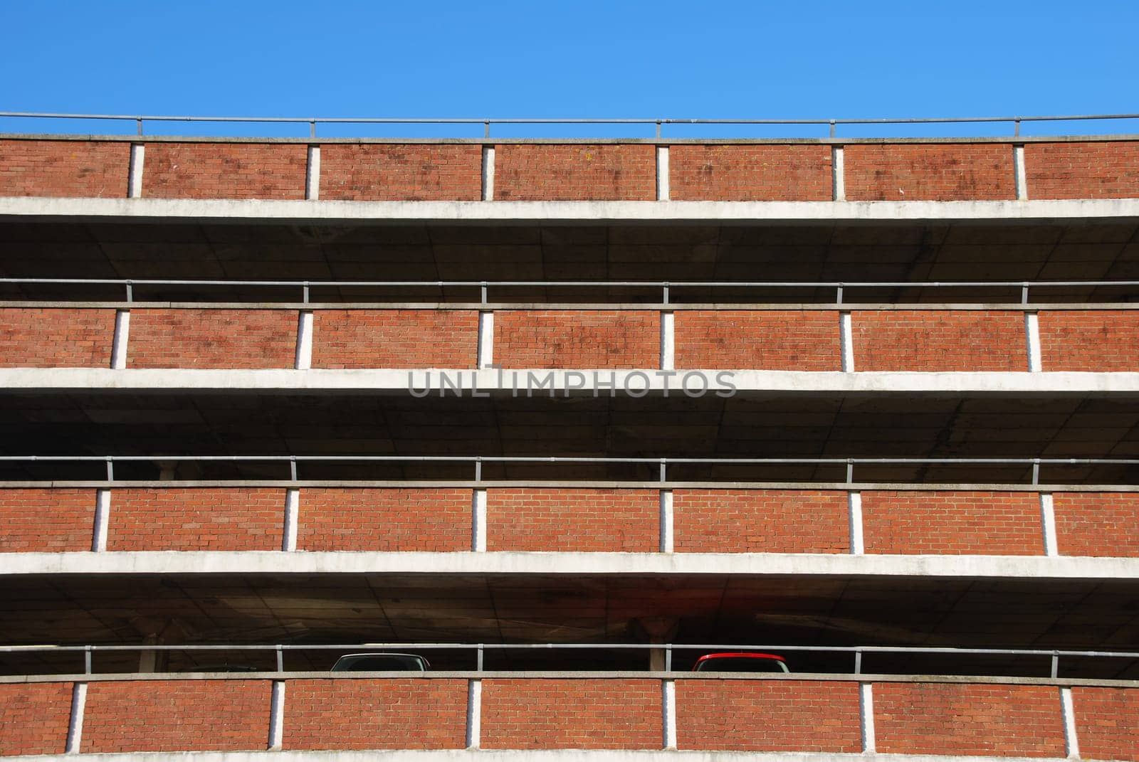 empty parking facility on a tall brick building