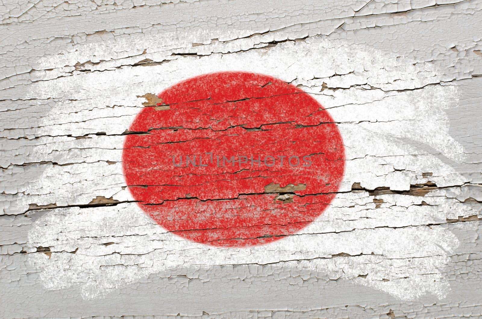 Chalky japanese  flag painted with color chalk on grunge wooden texture