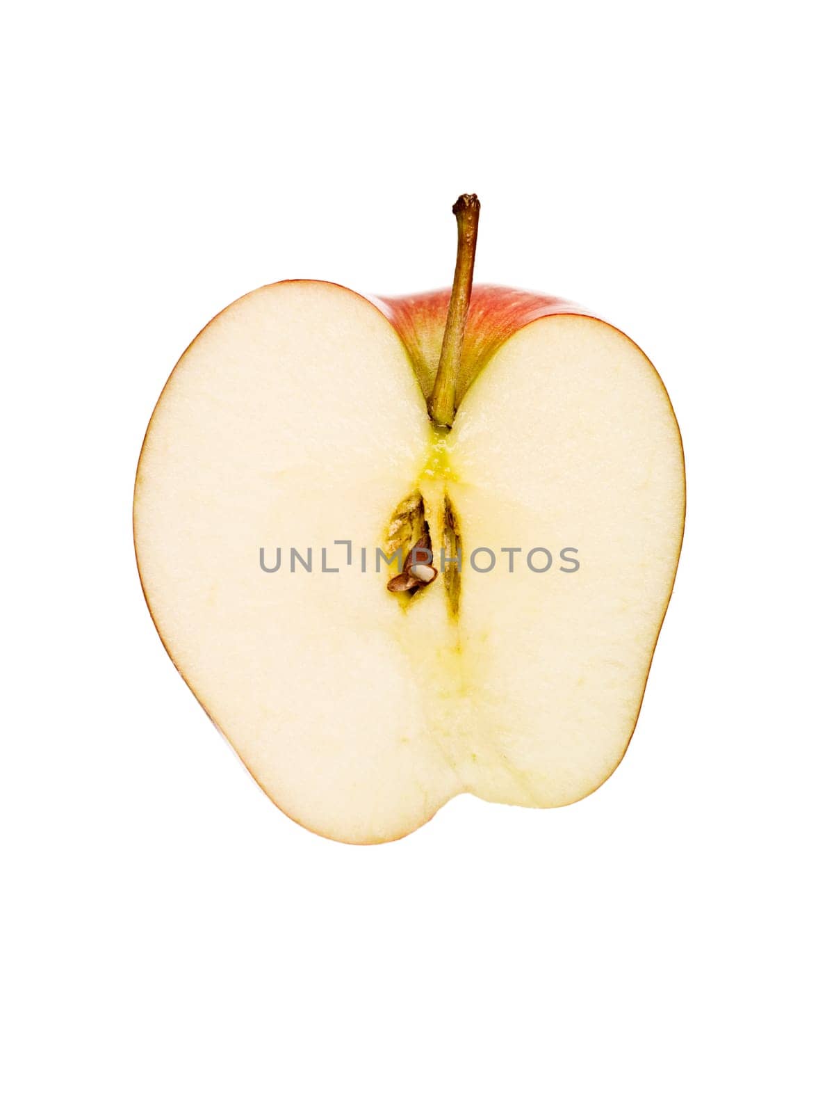 Apple cut in half isolated on white background