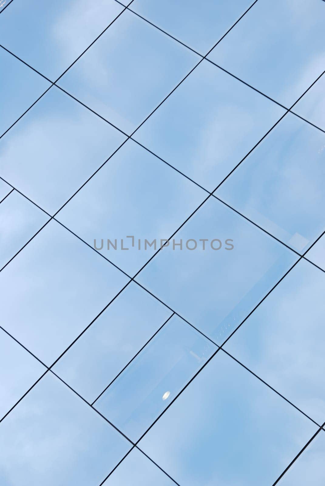 modern office building facade with glass pattern
