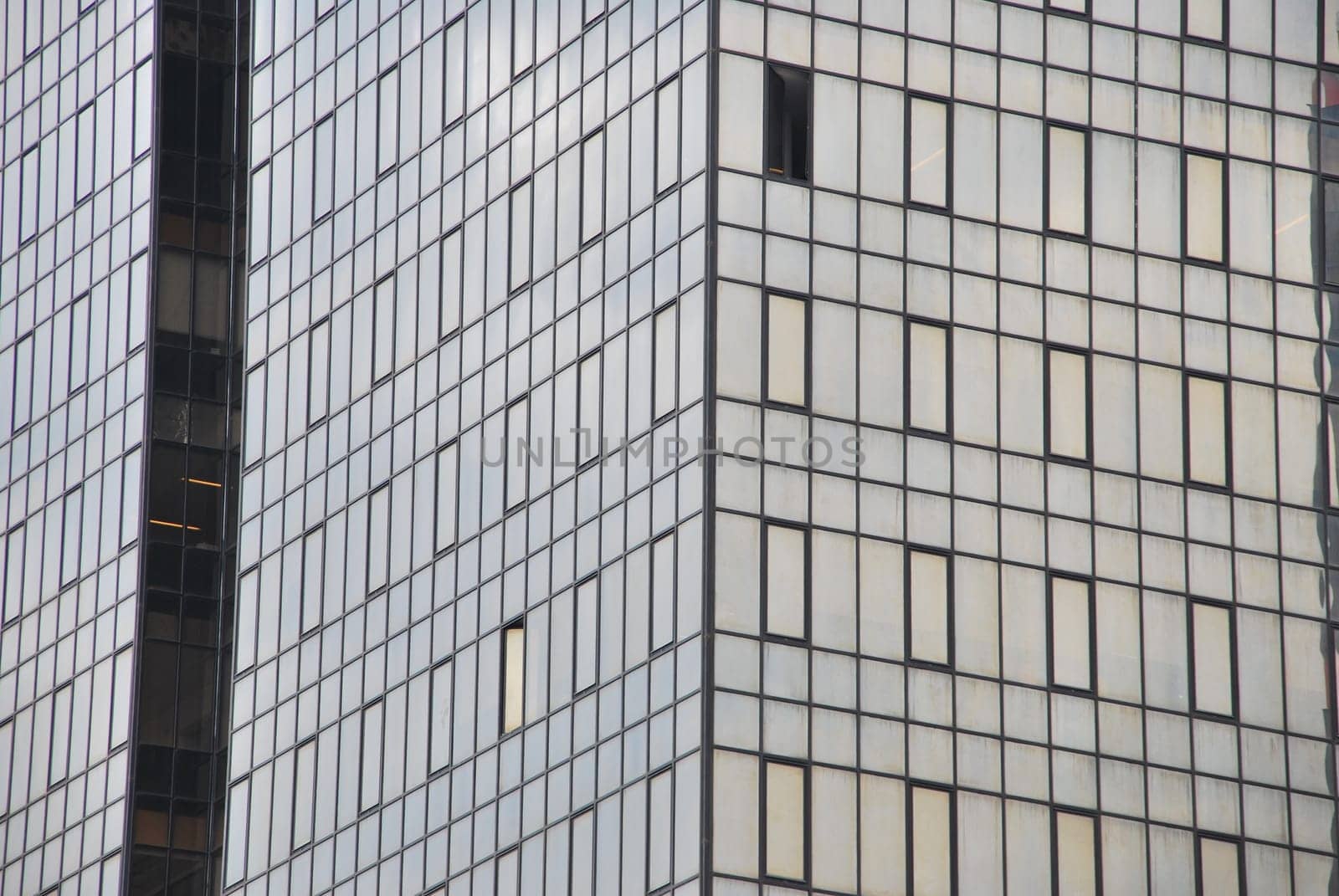 modern office building facade with glass pattern