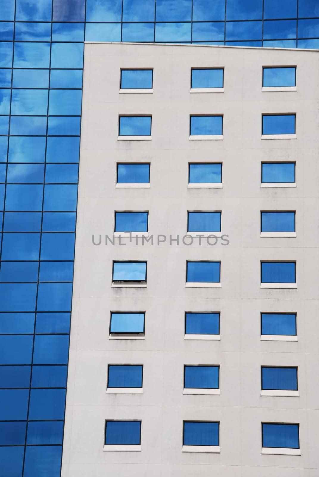 modern office building with glass pattern and concrete