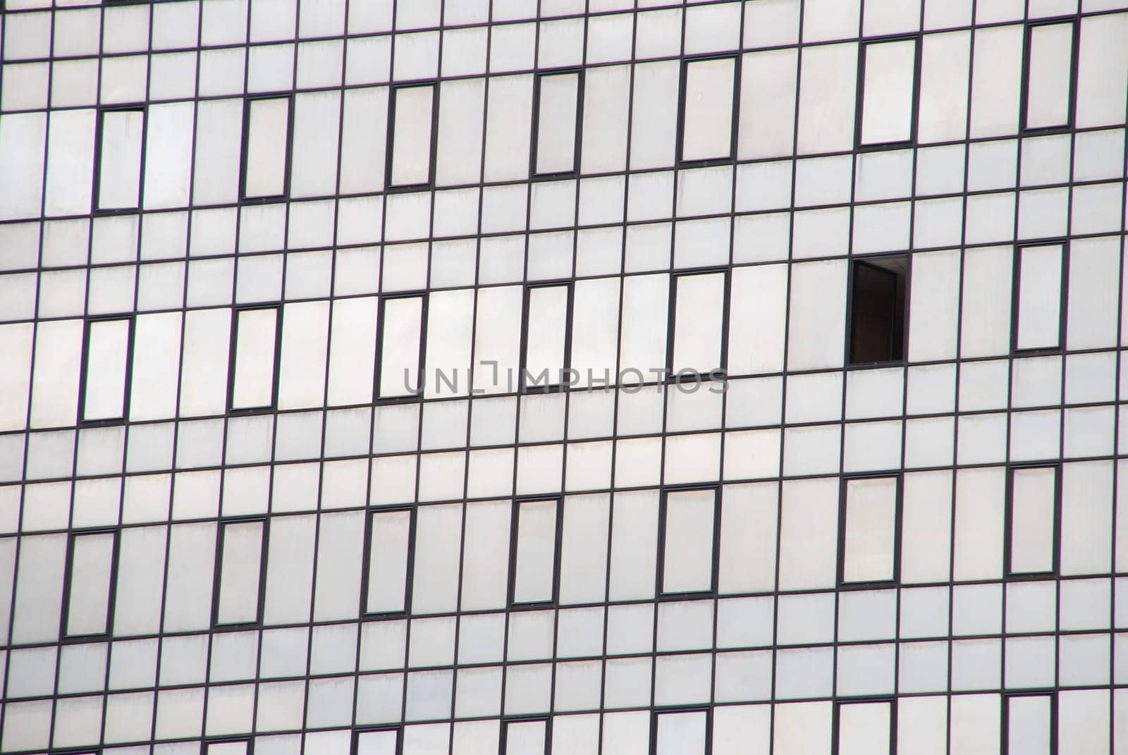 close-up on a modern office building facade with glass pattern